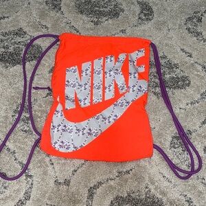 Nike monogram graphic drawstring Bag